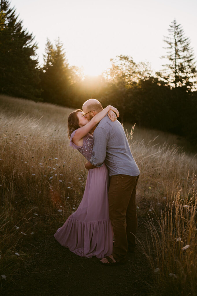 Warm rays of sun bathe a married couple in light as they pose for their anniversary photos at Fitton Green.