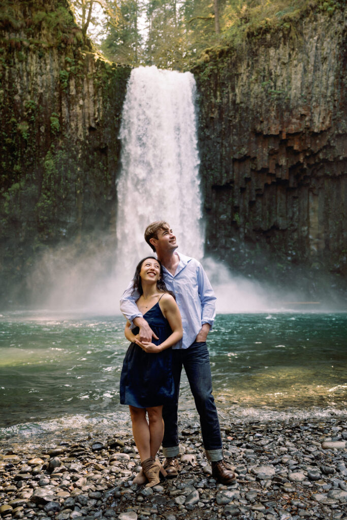A couple takes their engagement photos at Abiqua Falls near Scotts Mills in Oregon