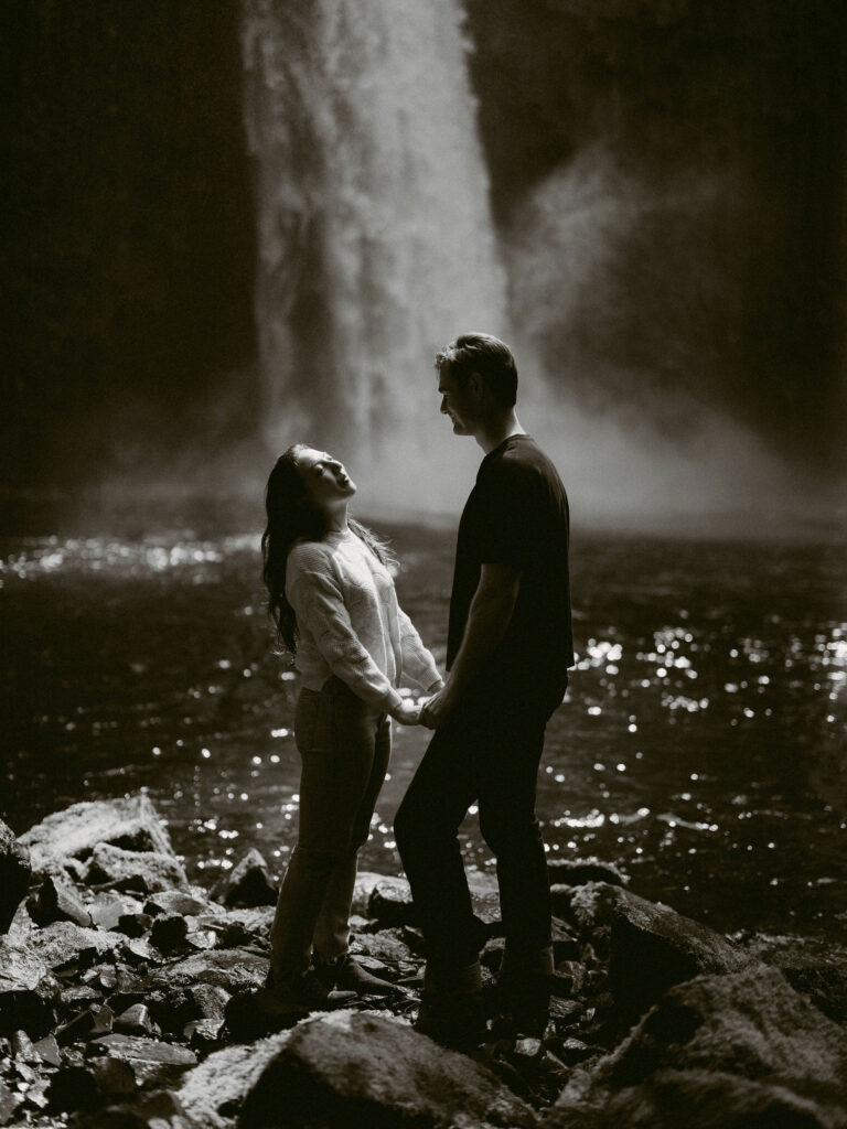 A moody black and white photo taken during an Abiqua Falls engagement session.