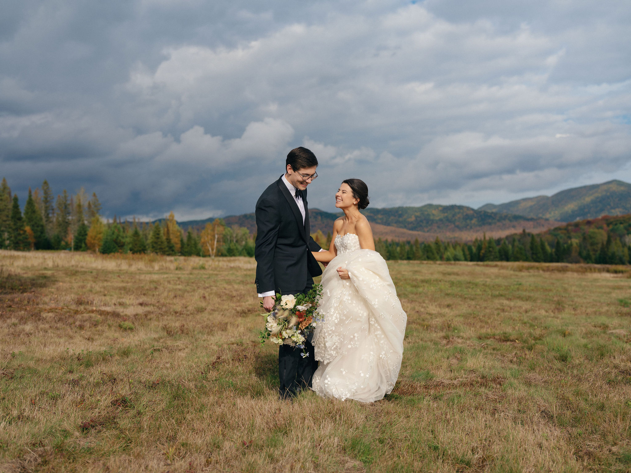 Lake Placid wedding couple portraits at a private estate with Adirondack mountains and fall foliage