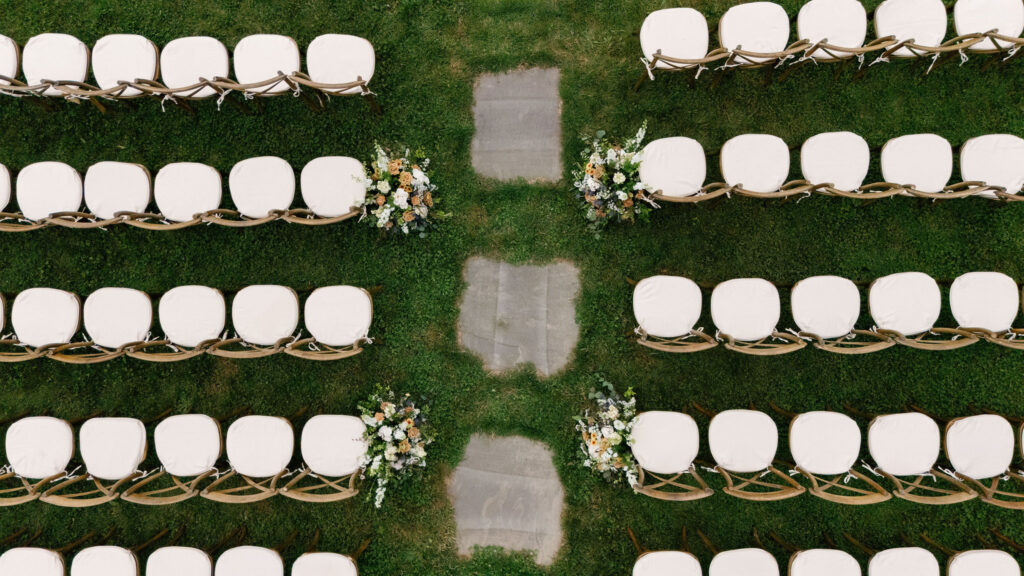 Overhead view of ceremony chairs and floral arrangements at a Lake Placid private estate wedding