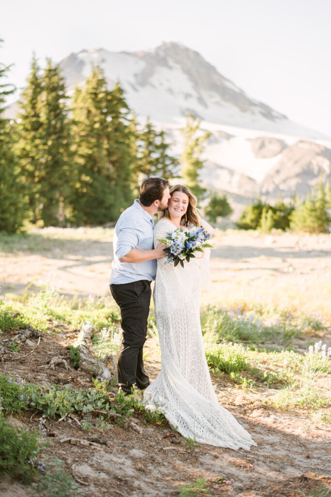 A bride wears a wedding dress from BHLDN during her summer wedding at Mount Hood Meadows