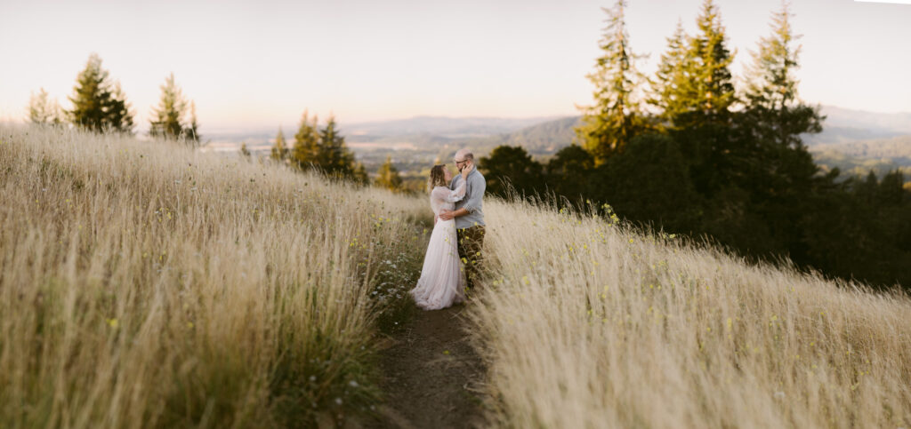 Mary's Peak can be seen in the background of this married couples' anniversary session at Fitton Green in Corvallis, Oregon.